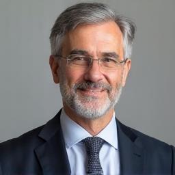 Professional headshot of Caner Ozkan, Of Counsel
