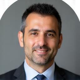 Professional headshot of Mehmet Kaya, Senior Associate